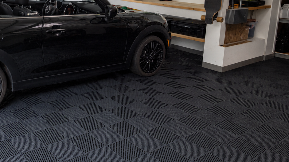 Car on durable garage tiles