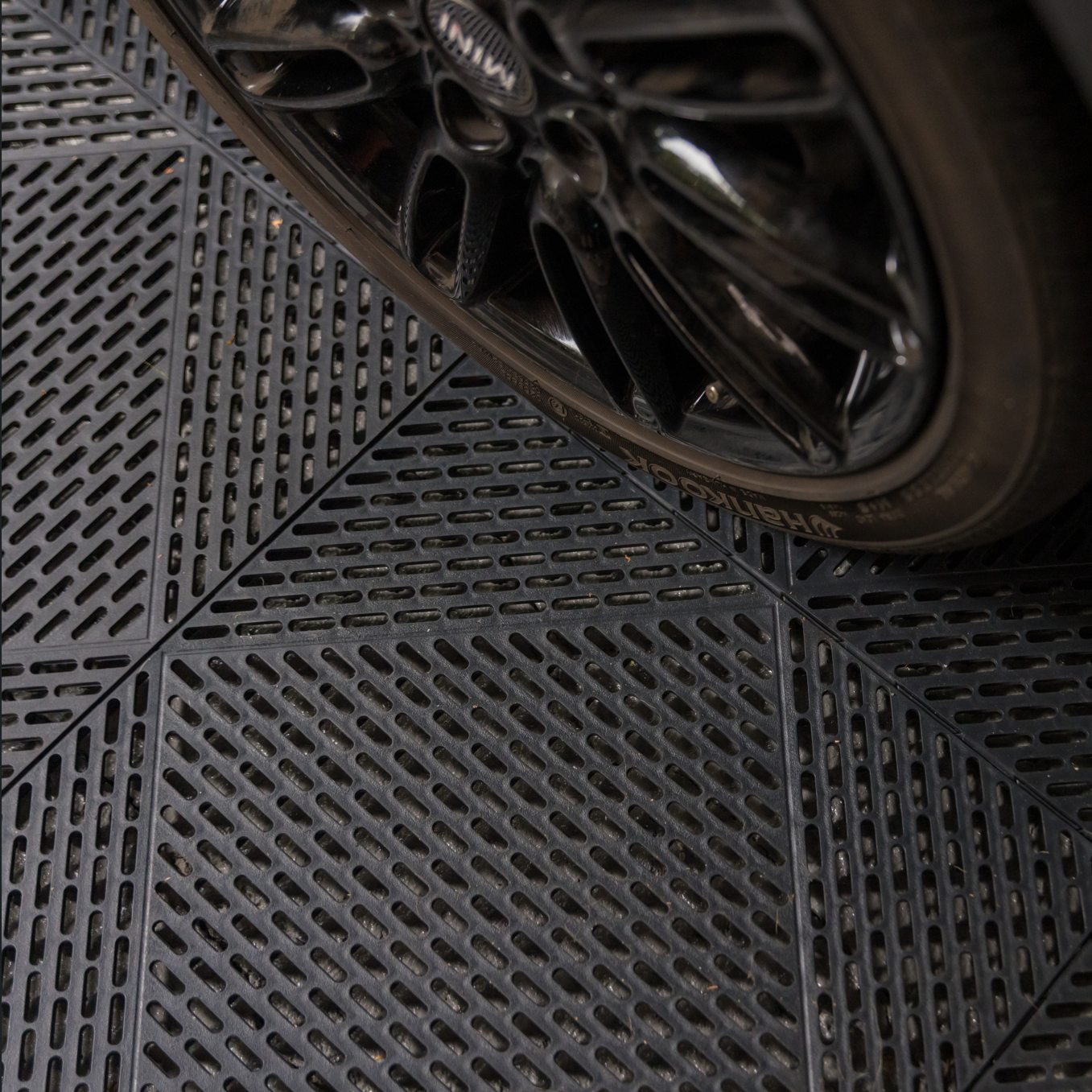Close up of interlocking drainage tile for garages